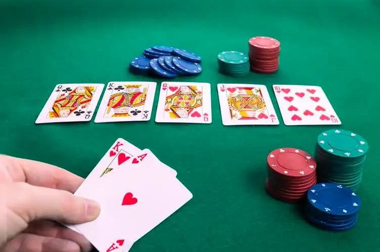 Filipino player browsing slot game library on smartphone at home in the Philippines
